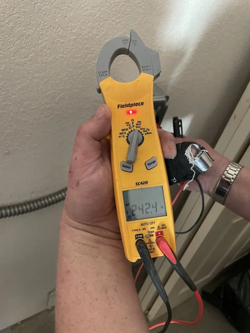 Voltage testing with clamp meter during Whole House Surge Protector in Hooksett